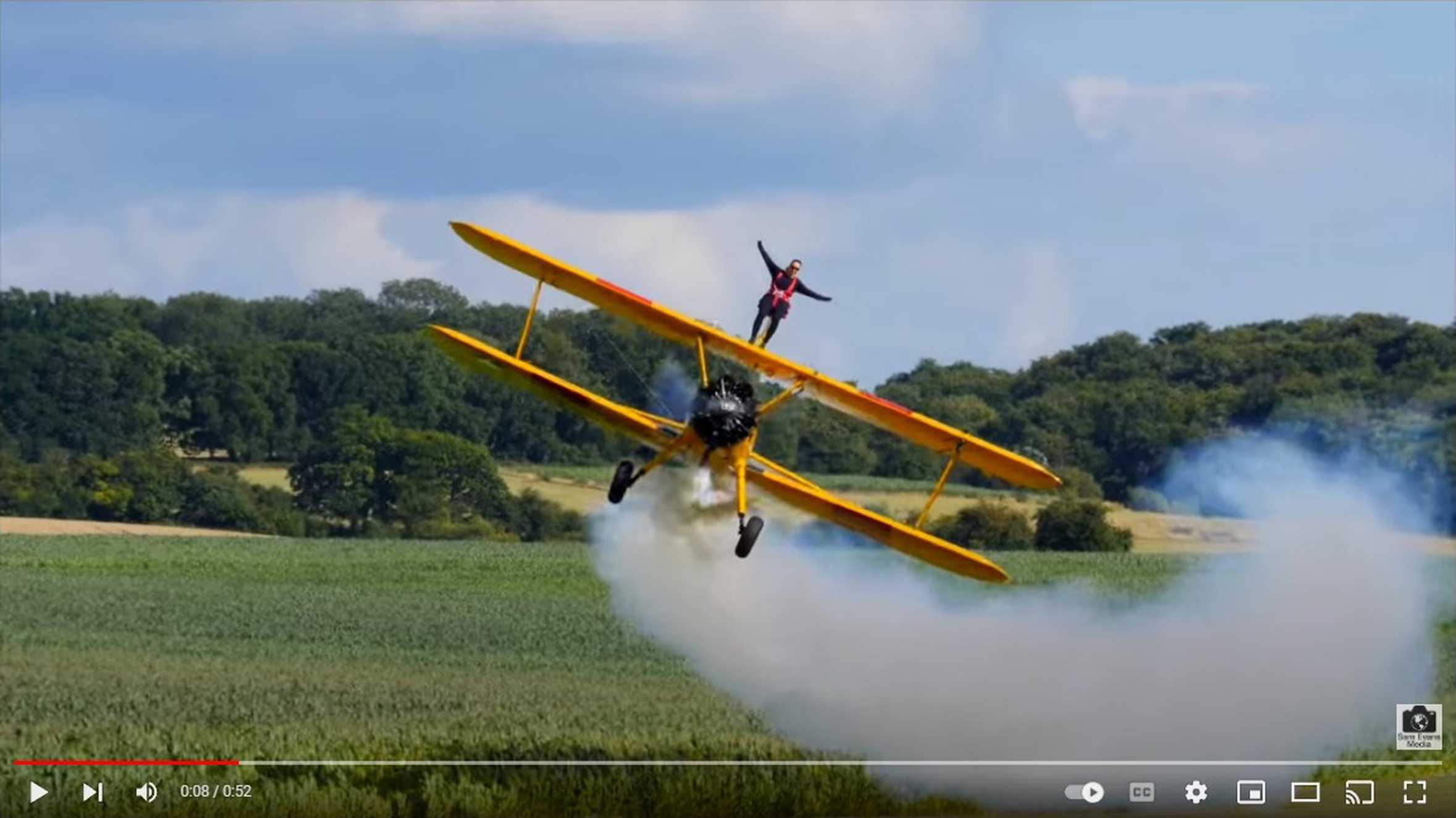 A still taken from a video of a person taking on a wing walk.